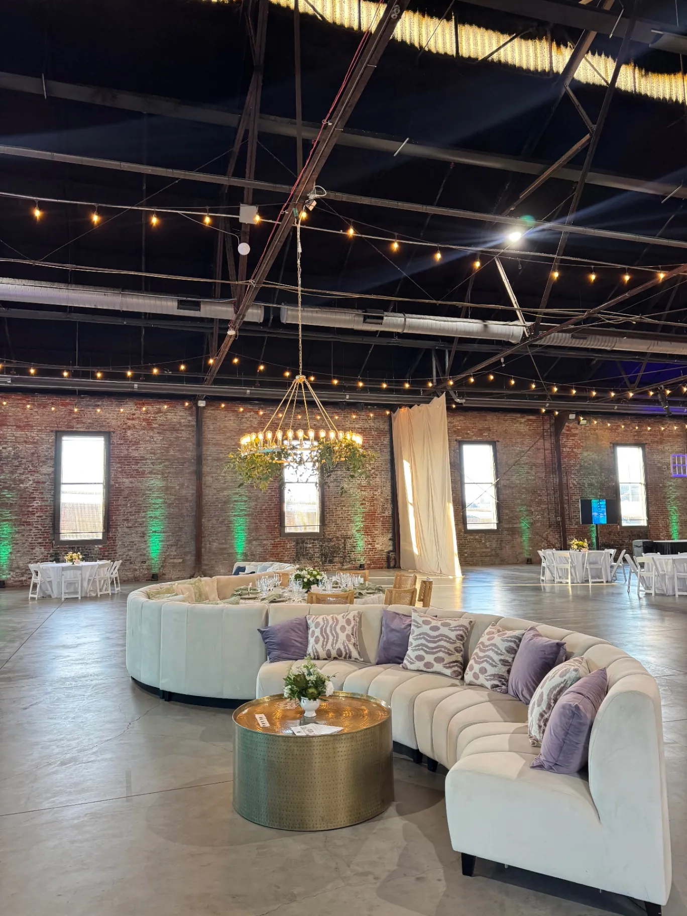 Lounge seating beneath a chandelier