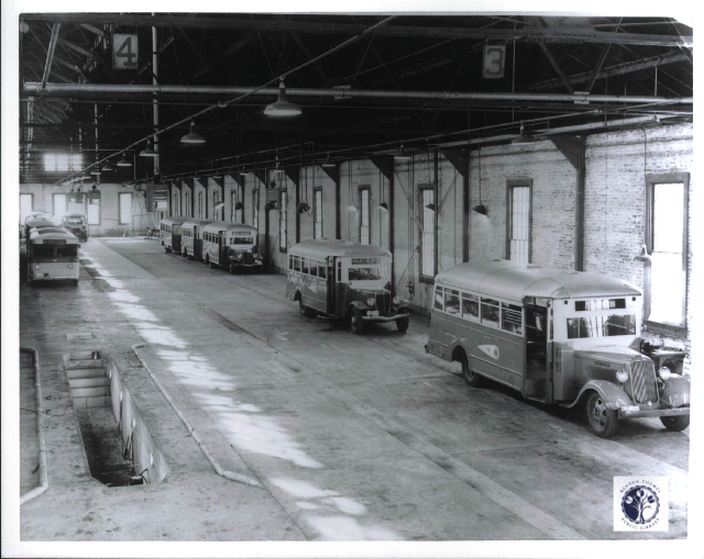 Historic bus depot lineup inside Newport Car Barn