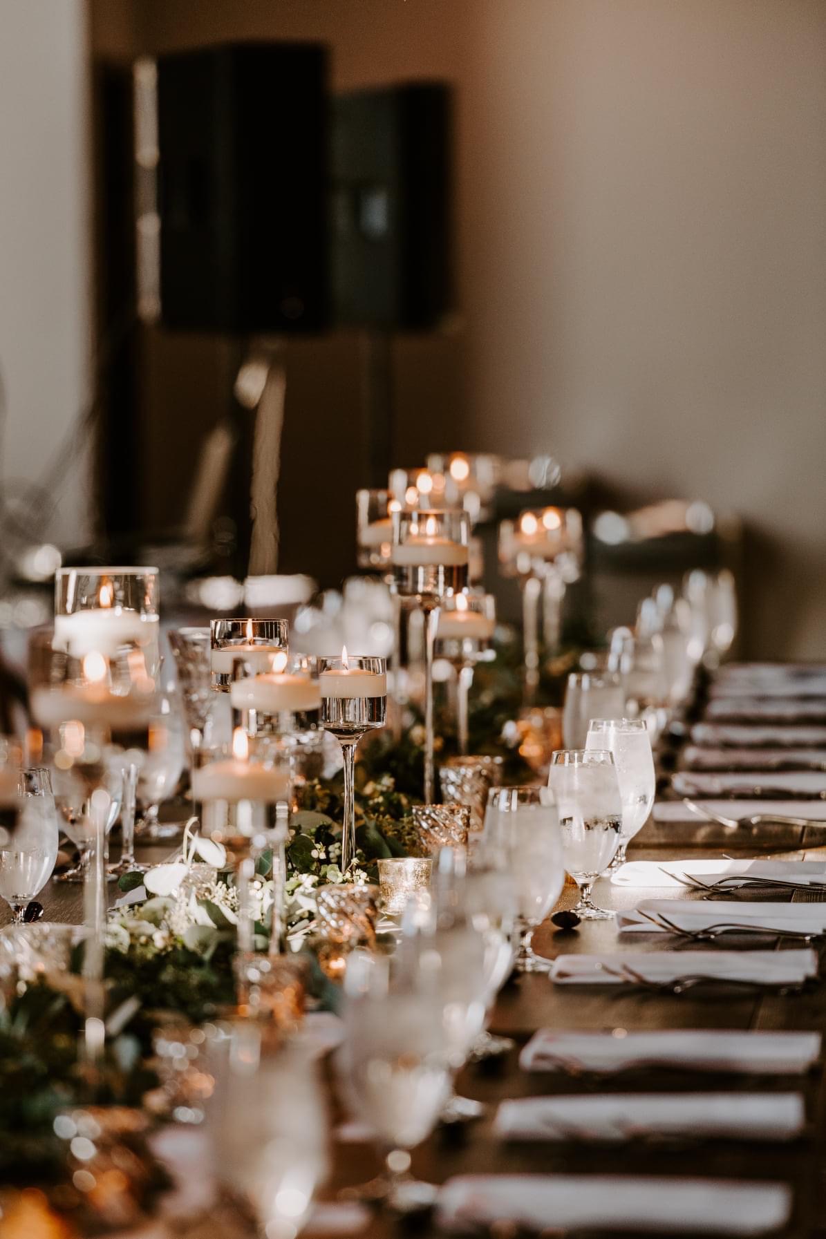 Floating candles down a head table