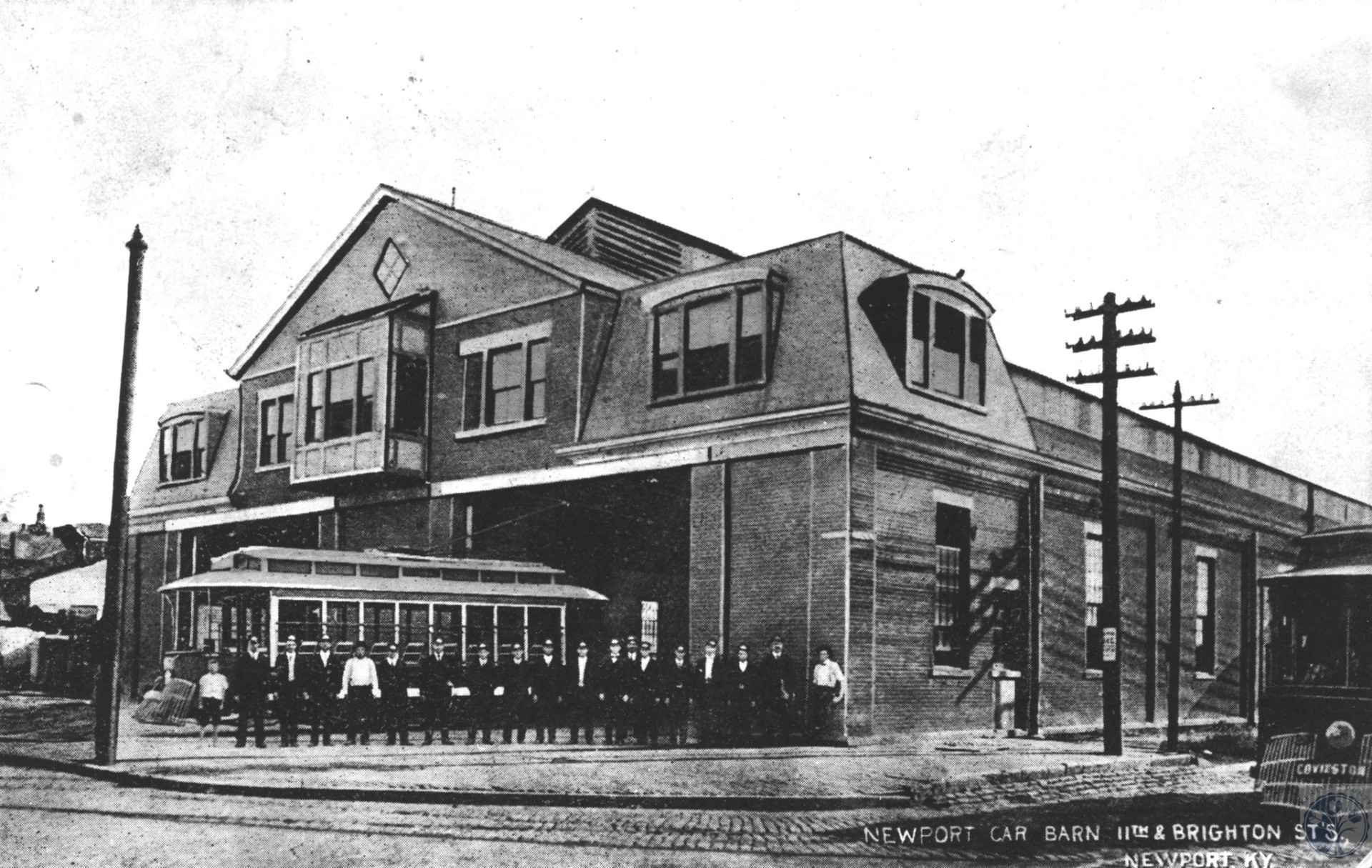 Historic photo of the original Newport Car Barn exterior at 11th and Brighton